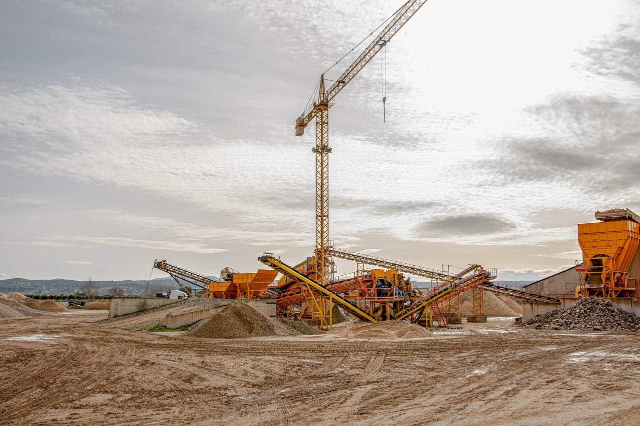 Site engineers reviewing plans at a construction site