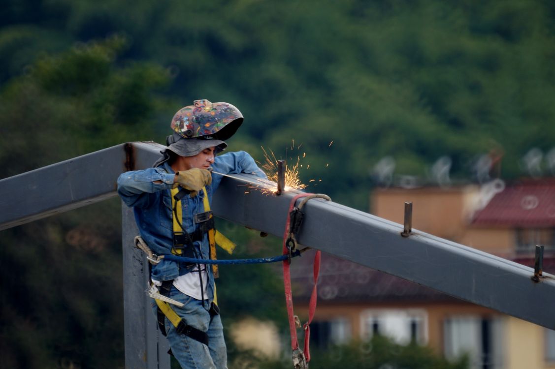 Worker on a steel framework
